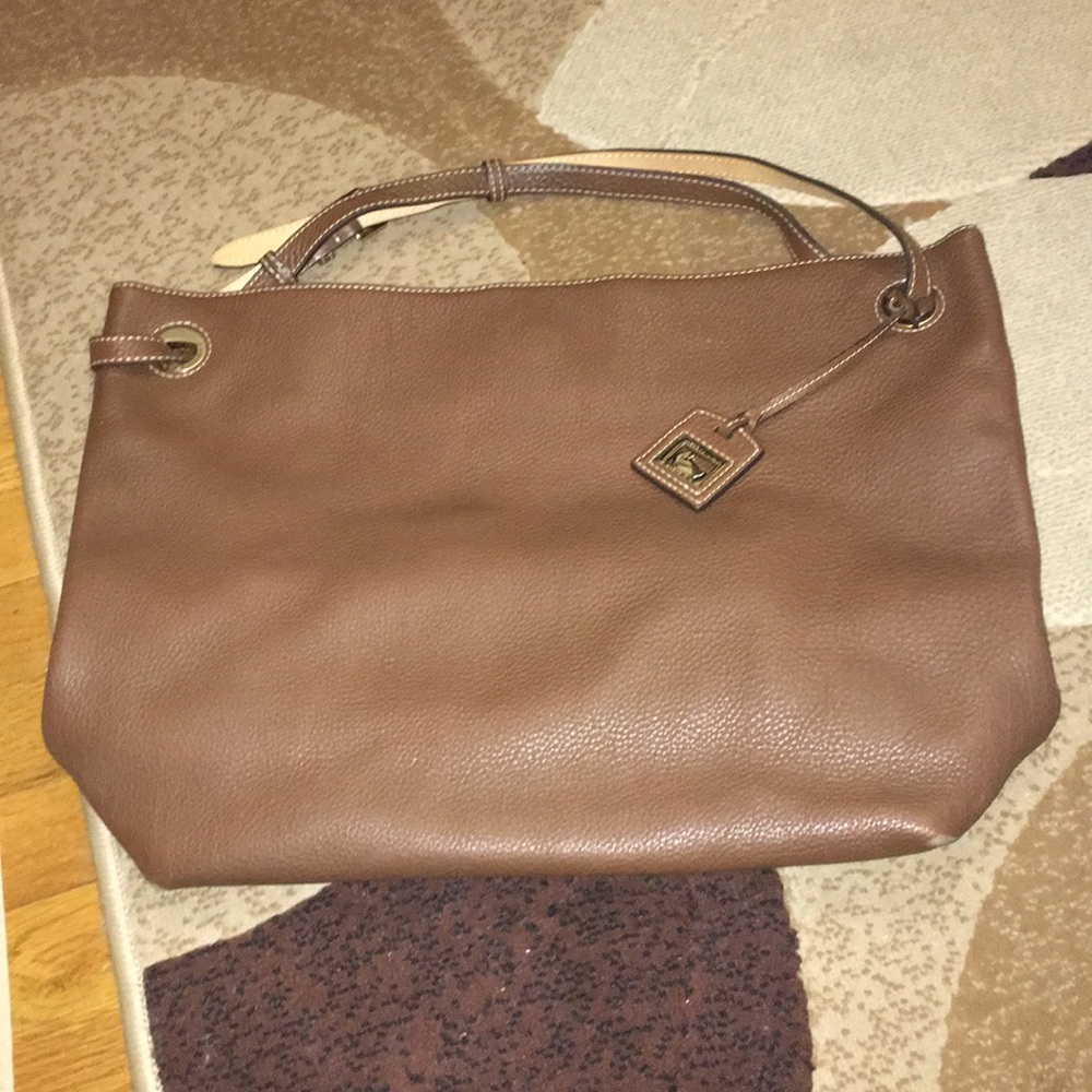 large, light brown Dooney & Bourke leather bag